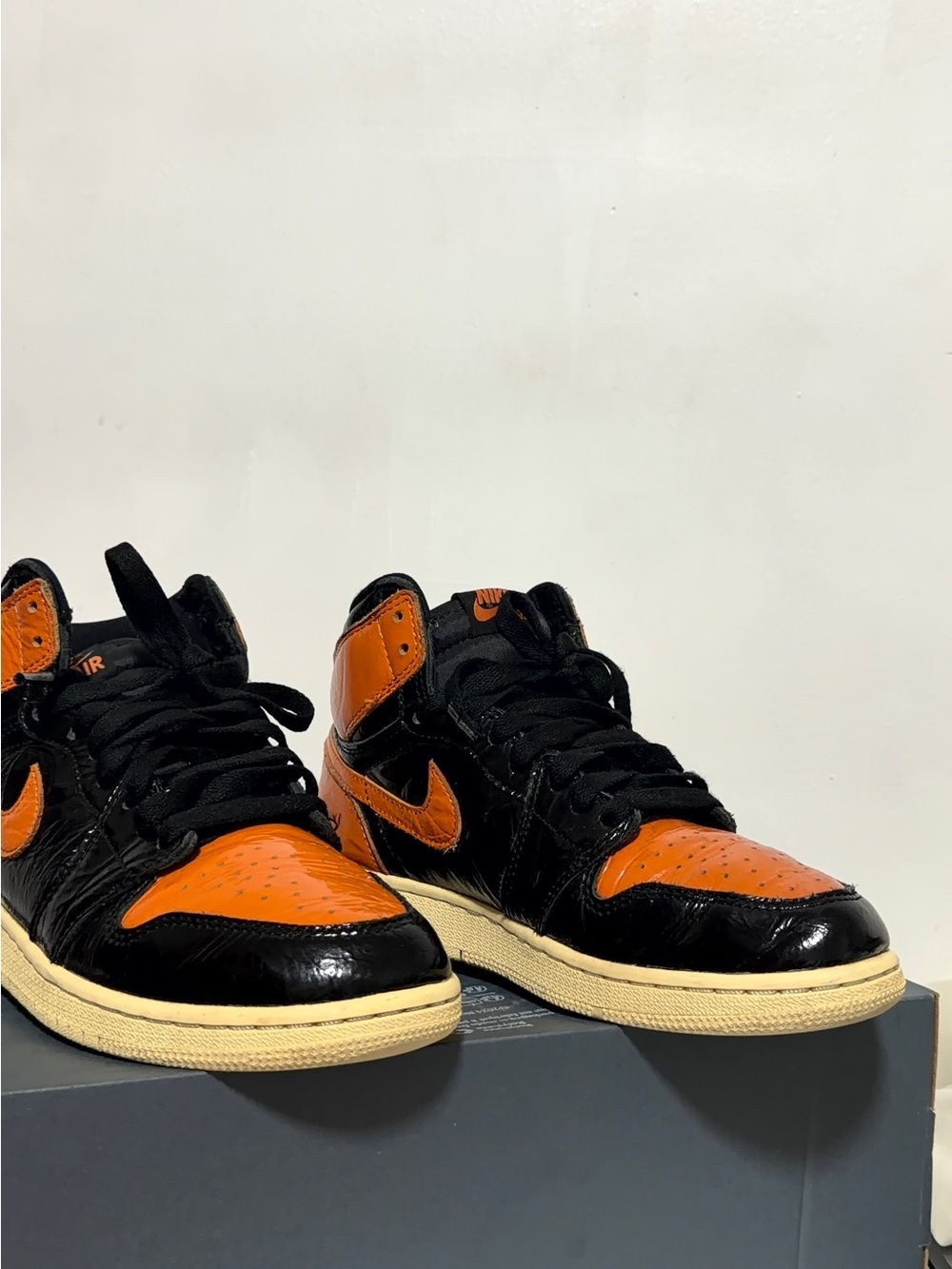 Nike Black and Orange High-Top Sneakers